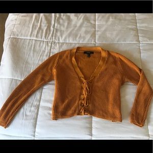 Crisscross crop sweater